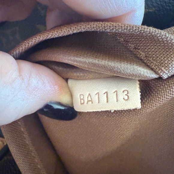 Louis Vuitton canvas rolling duffle bag, gently used. - Picture 6 of 14